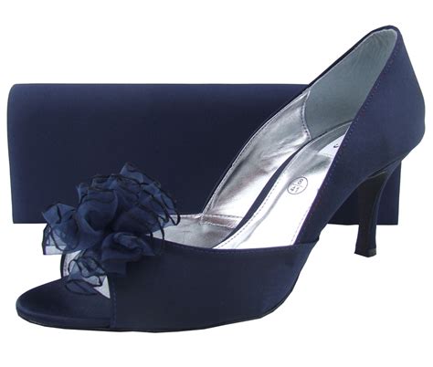 navy blue clutch bag and shoes